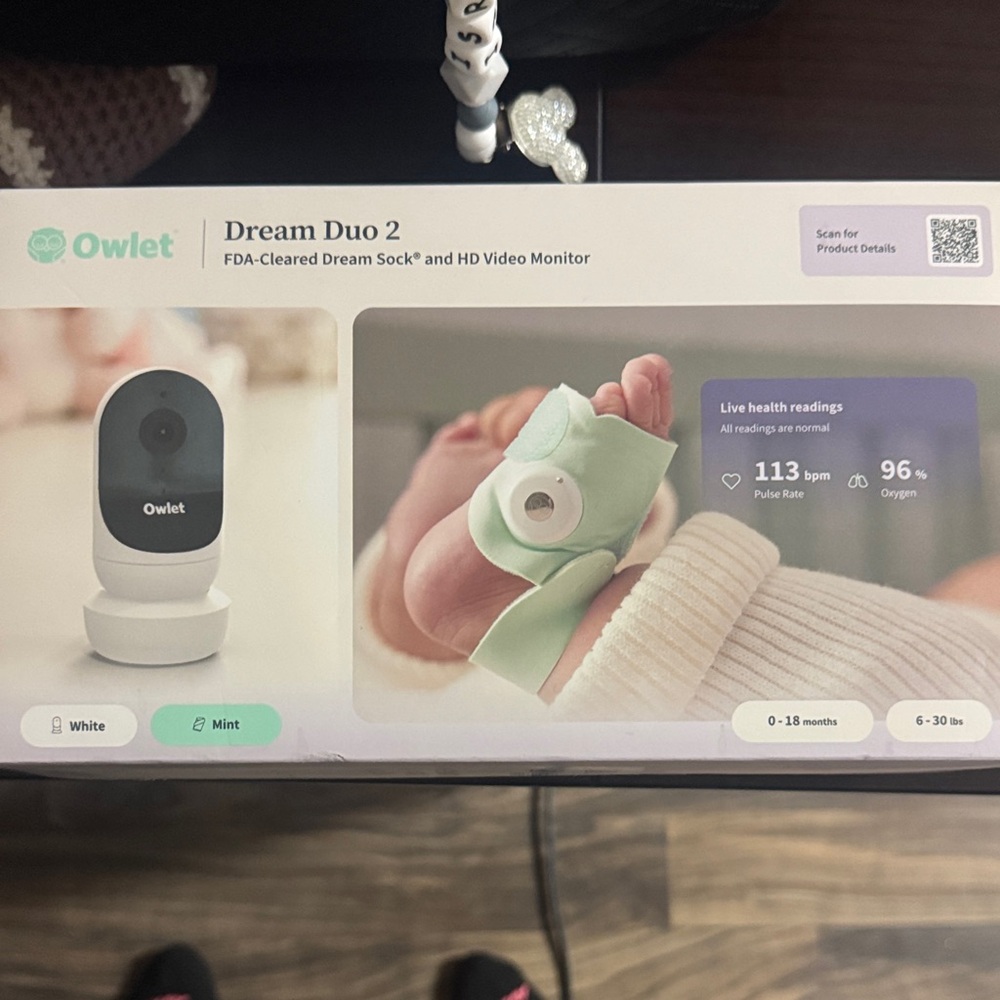 Owlet Dream Duo 2 Baby Monitor in White and Mint.